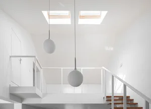 Modern minimalist staircase featuring white materials, viewed as a floor plan.
