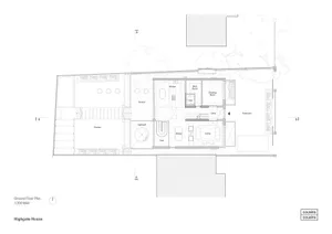 Floor plan of a modern residential building with concrete and glass elements.