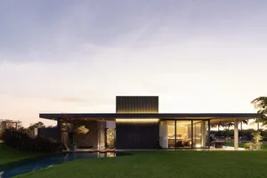 Modernist house with glass, wood, metal, and fiberglas