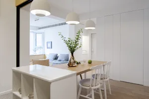 A modern kitchen with wooden elements and minimalist design
