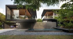 Modern residential architecture featuring concrete and glass materials.