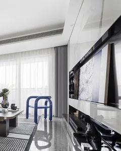 Modern minimalist living room featuring marble and glass elements.