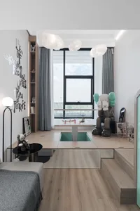 A modern, minimalist children's room with wooden furniture, a window, and decorative elements such as a large statue and book