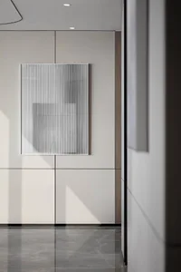 A modern office with a metallic striped panel.