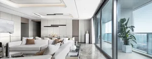 Modern living room featuring glass and marble elements