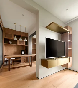 A modern living room featuring wooden accents and a television mounted on a wall.