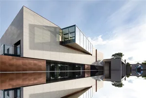 Modern building with concrete and glass exterior under a blue sky