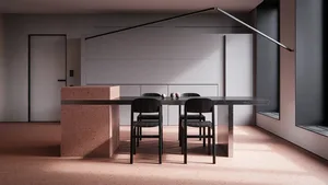 Industrial design interior with concrete table and black chairs.