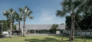 A modern interior with concrete and glass materials.
