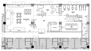 Floor plan of a commercial space with modern furniture and mixed materials.