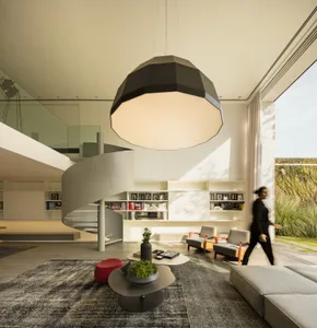 Modern residential interior design featuring minimalist aesthetic with concrete, glass, and metal elements.
