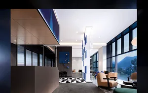Modern lobby with glass walls and blue-tiled accents