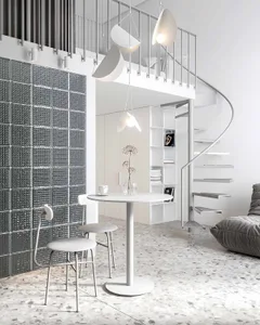 A minimalist apartment featuring glass block walls and a spiral staircase