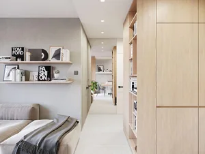 A minimalist residential interior featuring wooden materials and a neutral color palette.