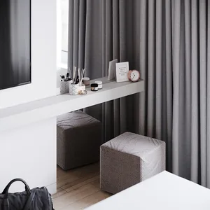 A modern minimalist bedroom featuring a concrete surface and minimalist decor.