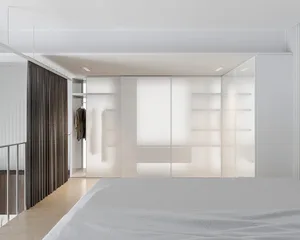 Modern minimalist bedroom featuring glass panel furniture and LED lighting under white ceiling and wooden floor.