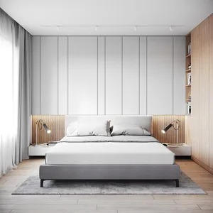 A minimalist bedroom with a gray bed and wooden accents