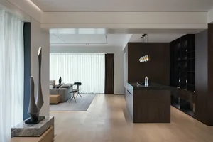 Modern residential interior with wooden flooring and marble accents
