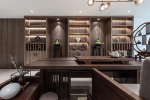 A modern tea room with wooden furniture, shelves, and decorative items.