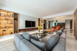Modern living room featuring luxurious marble floor tiles