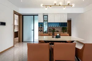 Modern dining room with marble counter, brown leather chairs, and blue and wooden accents.