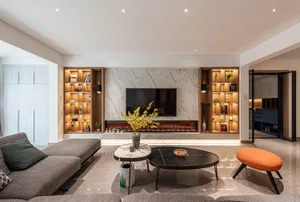 A modern minimalist living room featuring marble and glass materials