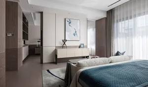 Modern bedroom with white walls, wooden furniture, and glass panel window