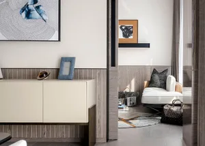 Modern living room featuring wood-paneled walls and a white upholstered chair with a black and white abstract painting hangin