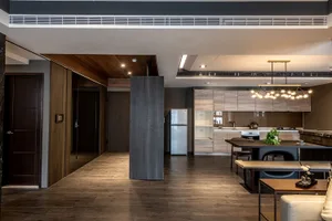Modern kitchen with wooden countertops, cabinets, and floor tiles.