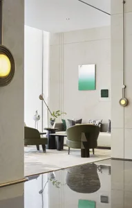 Modern living room featuring marble elements and contemporary furniture.