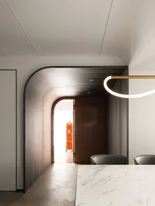A modern dining room with a marble table and wooden archways.