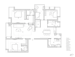 一張詳細的現代公寓平面圖，展示入口、餐廳、廚房、客廳等空間配置