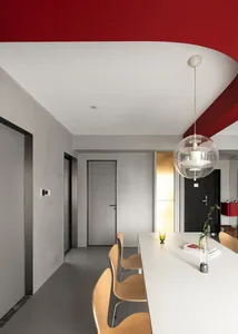Modern dining room featuring a white countertop and minimalist design.