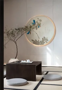 A minimalist tea ceremony space featuring wooden and ceramic elements.