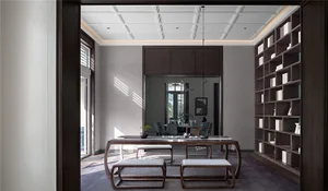 Modern living room with wooden furniture and a large bookshelf.