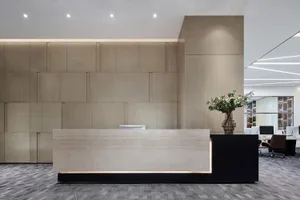 A modern office reception counter with a minimalist design.
