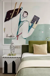 Modern bedroom with an abstract painting featuring an astronaut and a green headboard.