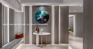A modern lobby featuring marble surfaces and wooden panels.