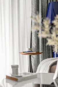 Contemporary furniture in a well-lit residential interior with minimalistic design elements.