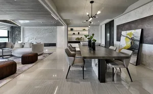 Modern residential interior featuring marble flooring and contemporary furniture