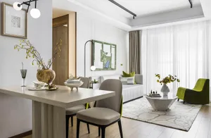 A modern living room featuring a mix of materials and light fixtures.