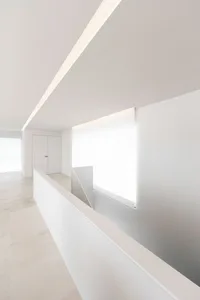 Modern interior space featuring concrete walls and minimalist design