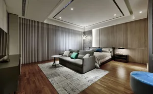 Modern minimalist bedroom featuring wooden furniture and fabric upholstery.