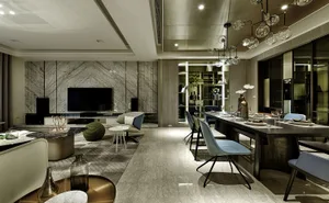 A modern living and dining room with marble finishes, featuring furniture and a chandelier.