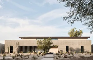 A minimalist concrete home with a clean, uncluttered design.