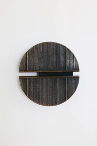 3D rendering of a modern circle with a textured black surface