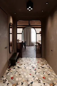 Modern home entry featuring a terrazzo tiled floor.
