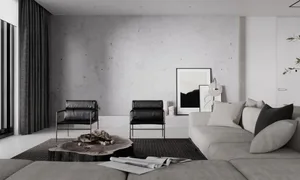 A modern living room with minimalist design, featuring black leather armchairs, a wooden coffee table, a large grey sofa, and