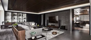 Modern living room featuring a sectional sofa, stone accent wall, and wooden furniture.
