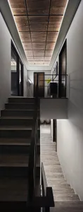 Modern minimalist staircase featuring a wooden design